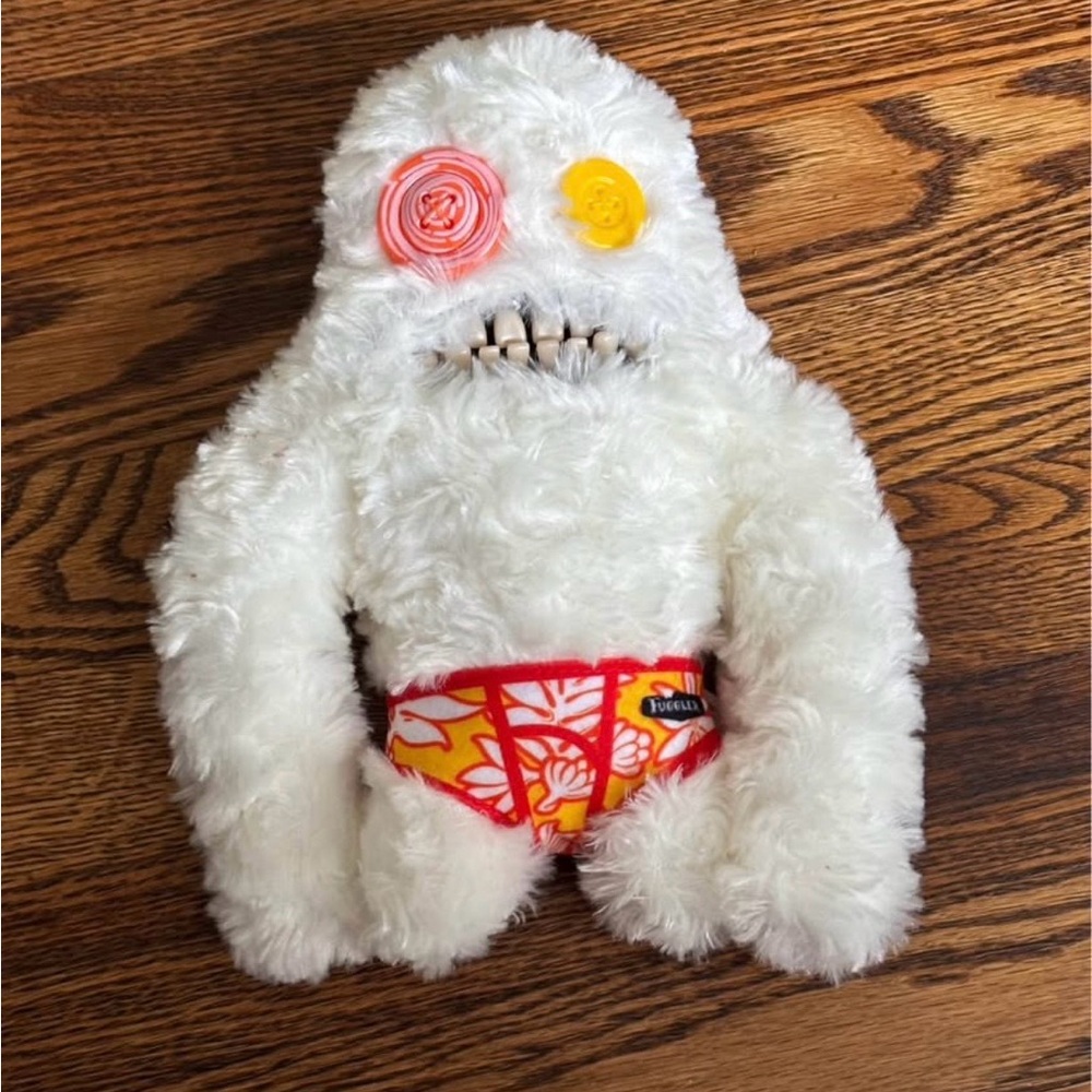 Fluffy White Monster Plush with Colorful Accents